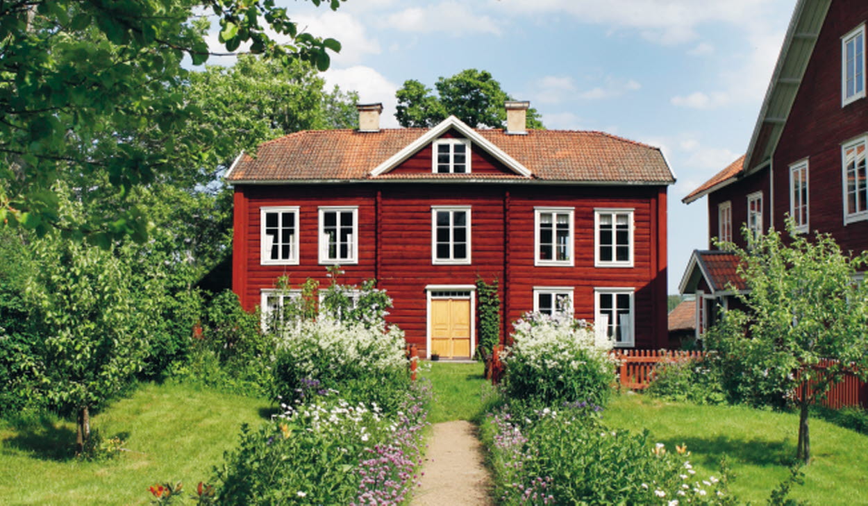 Världsarvsgården Erik Anders omringad av grönska